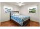 Cozy bedroom with double bed and two windows at 7695 17Th N Way, St Petersburg, FL 33702