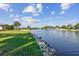 Stunning waterfront view with lush lawn and tranquil canal views at 853 Seacrest Dr, Largo, FL 33771