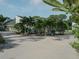 Aerial view of house nestled among tropical plants at 8900 143Rd St, Seminole, FL 33776
