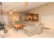 Relaxing living room featuring a large sectional sofa and wood coffee table at 8900 143Rd St, Seminole, FL 33776