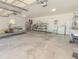 Large garage with plenty of storage space and a workbench at 8900 143Rd St, Seminole, FL 33776