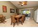 Spacious dining room with wooden table and seating at 8900 143Rd St, Seminole, FL 33776