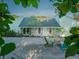 Charming backyard with gravel patio and firepit at 8900 143Rd St, Seminole, FL 33776