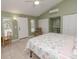 Charming bedroom with a king-size bed and beachy decor at 8900 143Rd St, Seminole, FL 33776