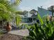 Relaxing pool area with lounge chairs and lush landscaping at 8900 143Rd St, Seminole, FL 33776