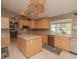 Spacious kitchen featuring an island, stainless steel appliances, and ample cabinetry at 8900 143Rd St, Seminole, FL 33776