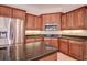 Kitchen with stainless steel appliances and granite counters at 12415 Maycrest Ave, Weeki Wachee, FL 34614