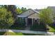 Two-story house with metal roof and front porch at 12902 Payton St, Odessa, FL 33556