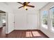 Bedroom with hardwood floors, large windows and closet at 2905 N 13Th St, Tampa, FL 33605
