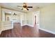 Open living room with hardwood floors, high ceilings, and built-in shelving at 2905 N 13Th St, Tampa, FL 33605