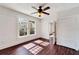 Sunlit bedroom with hardwood floors and a ceiling fan at 2905 N 13Th St, Tampa, FL 33605