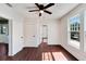 Spacious bedroom featuring hardwood floors and a ceiling fan at 2905 N 13Th St, Tampa, FL 33605