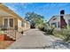 View of the home's driveway and side yard at 2905 N 13Th St, Tampa, FL 33605