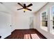 Charming bedroom, featuring wood floors and a ceiling fan at 2905 N 13Th St, Tampa, FL 33605