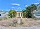Charming bungalow-style home with a landscaped yard at 3020 Clinton S St, Gulfport, FL 33707