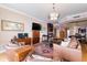 Living room with leather sofas, hardwood floors, and a view at 3507 Bayshore Blvd # 1003, Tampa, FL 33629