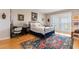 Bright bedroom with hardwood floors, a comfortable bed and built-in workspace at 3507 Bayshore Blvd # 1003, Tampa, FL 33629