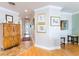 Long hallway with hardwood floors and framed art at 3507 Bayshore Blvd # 1003, Tampa, FL 33629