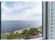 Stunning view of the water from a window, showcasing the cityscape in the distance at 3507 Bayshore Blvd # 1003, Tampa, FL 33629