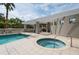 Inviting pool and hot tub with pergola and comfortable seating at 3507 Bayshore Blvd # 1003, Tampa, FL 33629