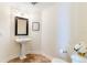 Small bathroom with pedestal sink and tiled floor at 3507 Bayshore Blvd # 1003, Tampa, FL 33629