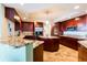 Modern kitchen with granite countertops, stainless steel appliances, and rich wood cabinetry at 3507 Bayshore Blvd # 1003, Tampa, FL 33629