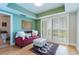 Cozy sitting area with a comfortable sofa and ottoman at 3507 Bayshore Blvd # 1003, Tampa, FL 33629