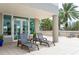 Relaxing patio area with lounge chairs and access to the building at 3507 Bayshore Blvd # 1003, Tampa, FL 33629