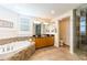 Spa-like bathroom with a large soaking tub and shower at 3507 Bayshore Blvd # 1003, Tampa, FL 33629