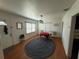 Cozy dining area with hardwood floors, natural light, and a quaint table setting at 3715 W Santiago St, Tampa, FL 33629