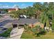 Aerial view of a charming house with a carport and neat landscaping at 3715 W Santiago St, Tampa, FL 33629