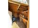 Interior view of a wooden shed, showcasing storage shelves and work space at 3715 W Santiago St, Tampa, FL 33629