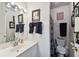 Simple bathroom with white vanity and shower/tub combo at 3715 W Santiago St, Tampa, FL 33629