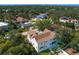 A sprawling home surrounded by lush greenery in a quiet, residential neighborhood at 4633 W Lowell Ave, Tampa, FL 33629