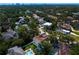 This stunning aerial view of a home reveals a well-kept neighborhood near parks and water at 4633 W Lowell Ave, Tampa, FL 33629