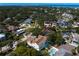 A sprawling estate nestled among mature trees in a quiet neighborhood provides seclusion and luxury at 4633 W Lowell Ave, Tampa, FL 33629