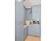 Charming butler's pantry with grey cabinets, stainless appliances, and granite counters at 4633 W Lowell Ave, Tampa, FL 33629