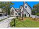 Charming home with well-manicured front lawn and appealing architectural details at 4633 W Lowell Ave, Tampa, FL 33629