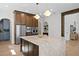 Well-lit kitchen with stainless steel appliances and a large marble island at 4633 W Lowell Ave, Tampa, FL 33629