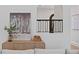 Living room featuring staircase and a modern painting at 4633 W Lowell Ave, Tampa, FL 33629