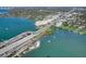 Aerial view of waterfront community with bridge and boats at 50 Harbor View Ln # 12A, Largo, FL 33770