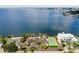 Waterfront property with a large home, pool, and tennis court at 5031 W San Miguel St, Tampa, FL 33629