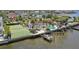 Waterfront home with private dock, pool, and tennis court at 5031 W San Miguel St, Tampa, FL 33629
