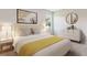 Bright bedroom featuring a comfortable bed and stylish decor at 10573 Bridgegate Heights Loop, San Antonio, FL 33576