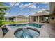 Large pool and spa with screened enclosure at 10645 Plantation Bay Dr, Tampa, FL 33647