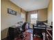 bedroom with twin bed, desk, and hardwood floors at 10645 Plantation Bay Dr, Tampa, FL 33647