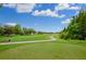 Landscaped golf course with a tree-lined fairway at 10645 Plantation Bay Dr, Tampa, FL 33647