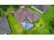 House with a private pool and screened enclosure at 10645 Plantation Bay Dr, Tampa, FL 33647