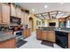 Spacious kitchen with island, stainless steel appliances, and granite countertops at 10645 Plantation Bay Dr, Tampa, FL 33647