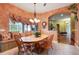 Cozy breakfast nook with built-in bench seating and wood table at 10645 Plantation Bay Dr, Tampa, FL 33647